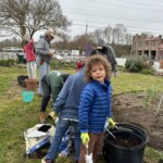 N.R.Y.G. kids working with soil in the garden 3/24
